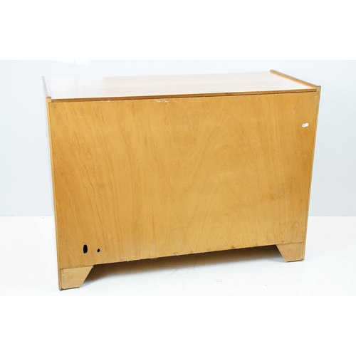 660 - Nathan Furniture teak side units, one comprising an arrangement of four drawers above two panelled d... 