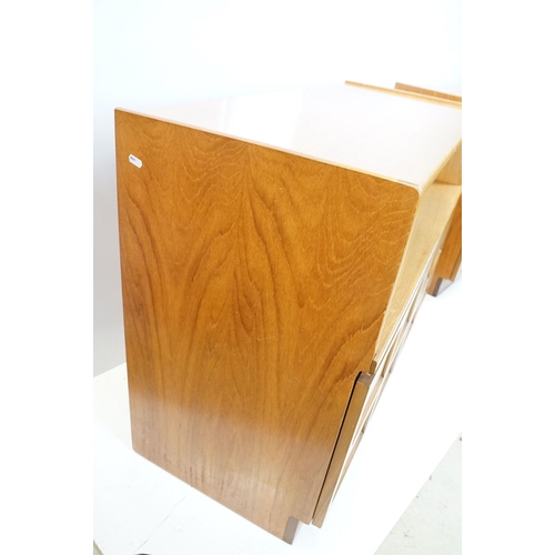 660 - Nathan Furniture teak side units, one comprising an arrangement of four drawers above two panelled d... 