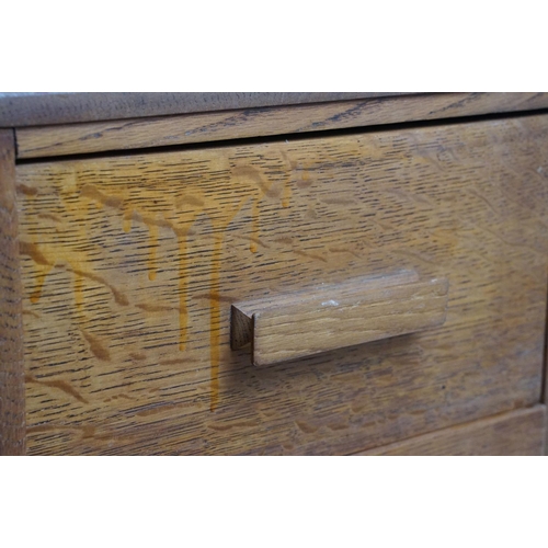 671 - 20th century oak kneehole desk, with a hexagonal top over an arrangement of six drawers, 62cm high x... 