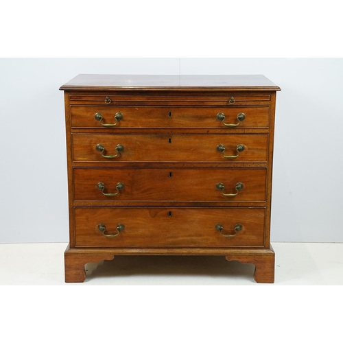 673 - 20th century mahogany chest of four long drawers with brushing slide, on bracket feet, 78cm high x 8... 