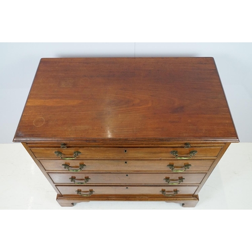 673 - 20th century mahogany chest of four long drawers with brushing slide, on bracket feet, 78cm high x 8... 