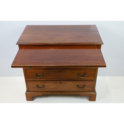 673 - 20th century mahogany chest of four long drawers with brushing slide, on bracket feet, 78cm high x 8... 