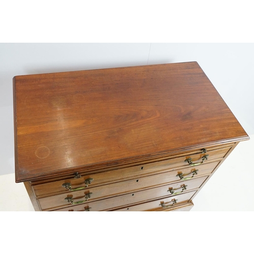 673 - 20th century mahogany chest of four long drawers with brushing slide, on bracket feet, 78cm high x 8... 