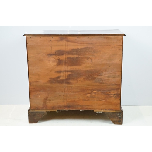 673 - 20th century mahogany chest of four long drawers with brushing slide, on bracket feet, 78cm high x 8... 