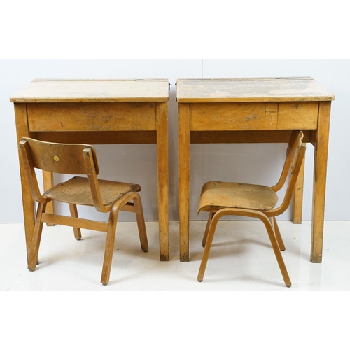 675 - Two mid century school desks and chairs, the desks - 71cm high x 60.5cm wide x 50.5cm deep