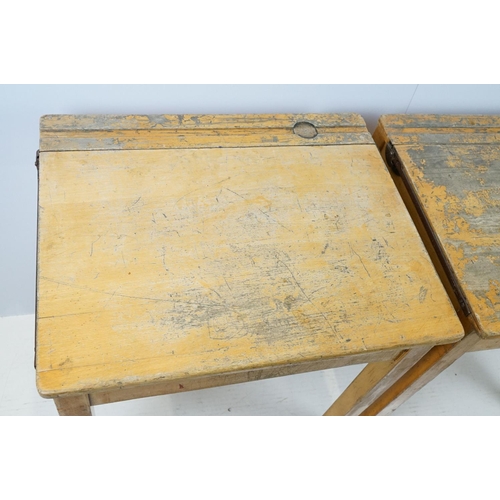 675 - Two mid century school desks and chairs, the desks - 71cm high x 60.5cm wide x 50.5cm deep