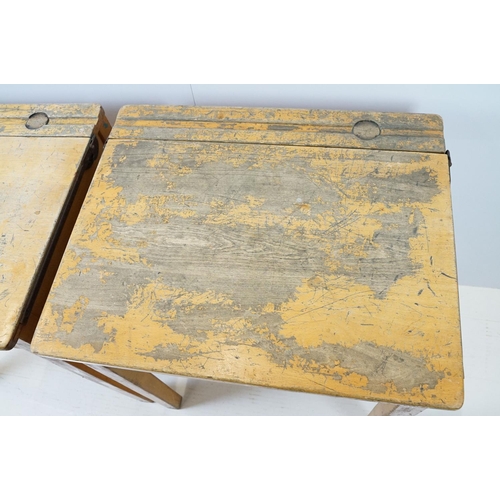 675 - Two mid century school desks and chairs, the desks - 71cm high x 60.5cm wide x 50.5cm deep