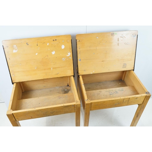 675 - Two mid century school desks and chairs, the desks - 71cm high x 60.5cm wide x 50.5cm deep