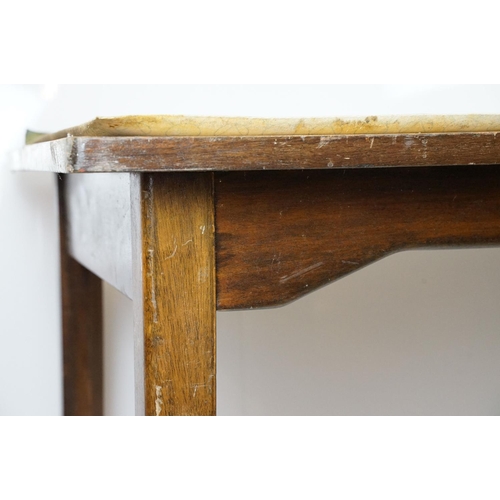 680 - Mid century mahogany table with green leatherette inset top, on square tapering legs, marked undersi... 