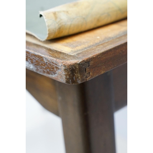 680 - Mid century mahogany table with green leatherette inset top, on square tapering legs, marked undersi... 