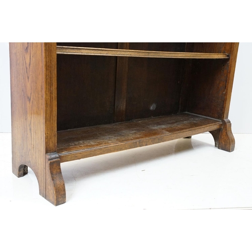 684 - Oak three shelf bookcase with Greek key frieze design, 102cm high x 92cm wide x 26cm deep