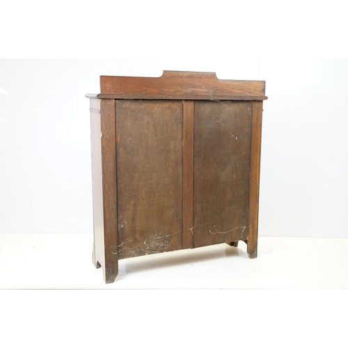 684 - Oak three shelf bookcase with Greek key frieze design, 102cm high x 92cm wide x 26cm deep