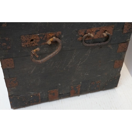 697 - Early 20th century oak and metal mounted travelling trunk, with two handles to each side, brass plaq... 