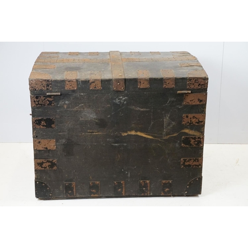 697 - Early 20th century oak and metal mounted travelling trunk, with two handles to each side, brass plaq... 