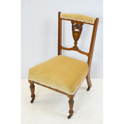 702 - Edwardian mahogany low chair, with pierced inlaid splat back, on turned tapering legs and castors, 7... 