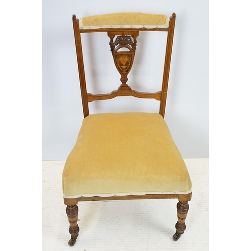 702 - Edwardian mahogany low chair, with pierced inlaid splat back, on turned tapering legs and castors, 7... 