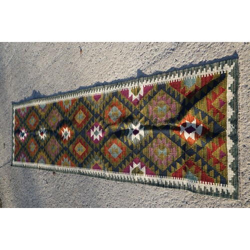 696 - Woollen hand knotted Maimana Kilim runner rug, 288cm x 75cm