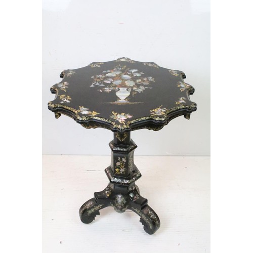 656 - Victorian Papier Mache Tilt Top Table, the shaped top with mother of pearl and gilt decoration havin... 