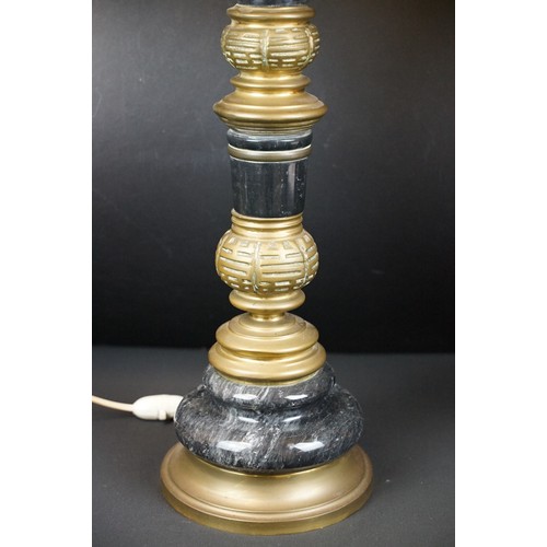 169A - Two black marble table lamps with brass mounts, the tallest 65cm high