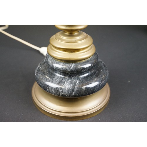 169A - Two black marble table lamps with brass mounts, the tallest 65cm high