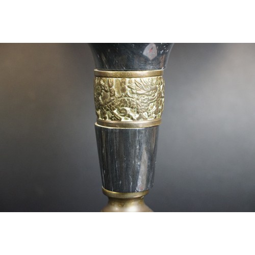 169A - Two black marble table lamps with brass mounts, the tallest 65cm high