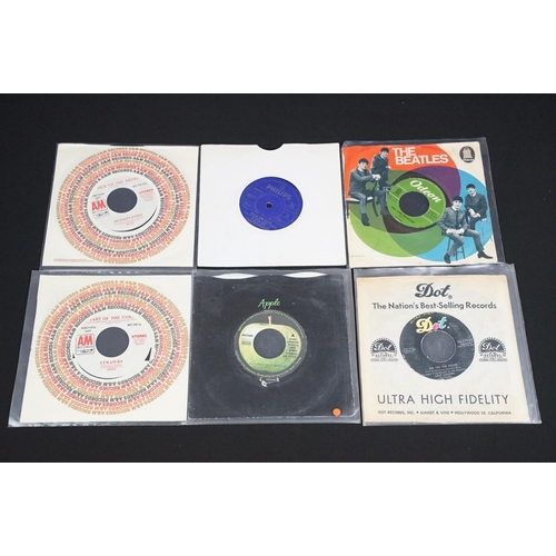 303 - Vinyl - 18 Rock and Pop foreign pressing 7” singles including many demo promos to include: The Beatl... 