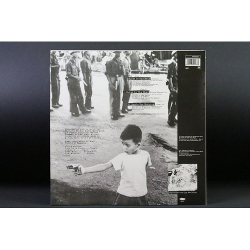 506 - Vinyl - One album and one 12” by Rage Against The Machine to include: Rage Against The Machine (orig... 