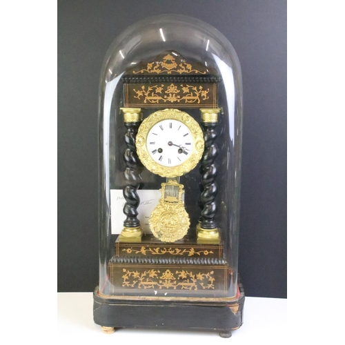 161 - French Empire Napoleon III pillar striking eight day mantel clock, the gilt metal & ebonised wood ca... 