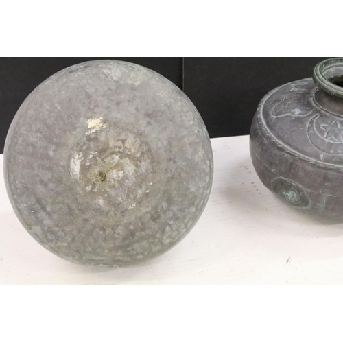 185 - Two Indian copper hammered water vessels each of round form with open tops, with hammered detailing ... 