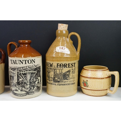 125 - Collection of cider bottles and mugs to include the Taunton cider company, Matthew Clarke, Coombes c... 