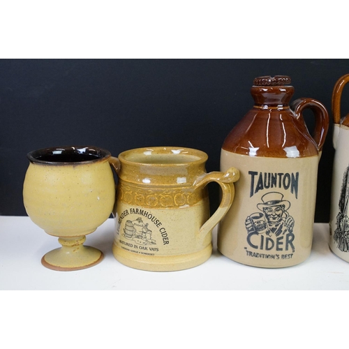 125 - Collection of cider bottles and mugs to include the Taunton cider company, Matthew Clarke, Coombes c... 