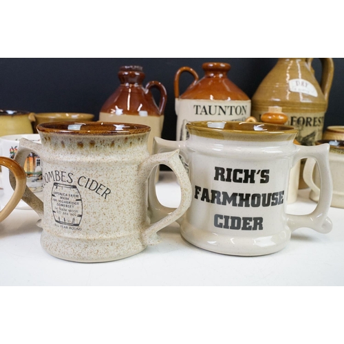 125 - Collection of cider bottles and mugs to include the Taunton cider company, Matthew Clarke, Coombes c... 