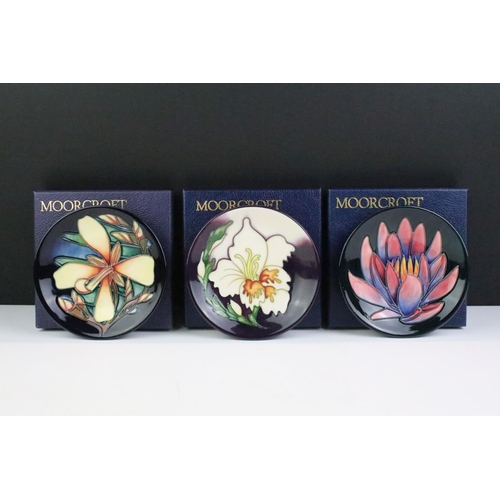 13 - Three Moorcroft small shallow dishes, including: Panache pattern, 12cm diameter, boxed and two other... 