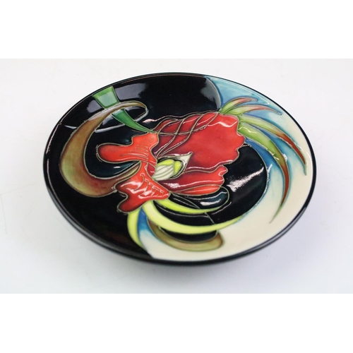 15 - Three Moorcroft small shallow dishes, comprising: Satin Flower pattern, 12cm diameter, boxed, Cleopa... 