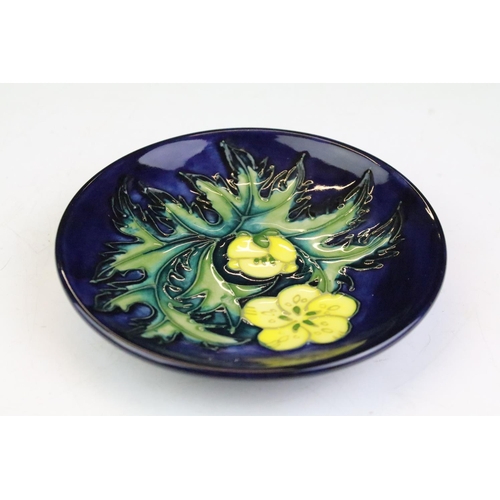 18 - Four Moorcroft small shallow dishes, comprising: Hibiscus pattern, Finch and Fruit pattern, Buttercu... 