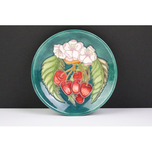 18 - Four Moorcroft small shallow dishes, comprising: Hibiscus pattern, Finch and Fruit pattern, Buttercu... 