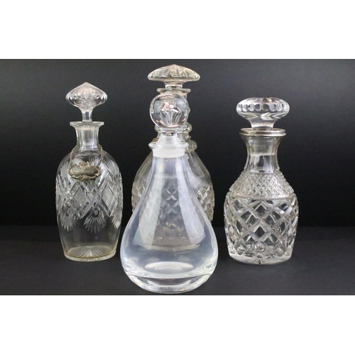 19 - Cut glass decanter with silver collar, 25cm high, a cut glass decanter, 30.5cm high, a cut glass dec... 