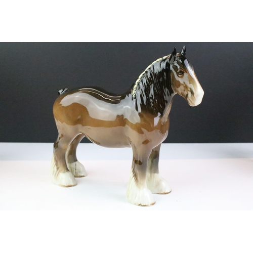 27 - Collection of seven Beswick porcelain horses / ponies to include six brown gloss examples and a matt... 