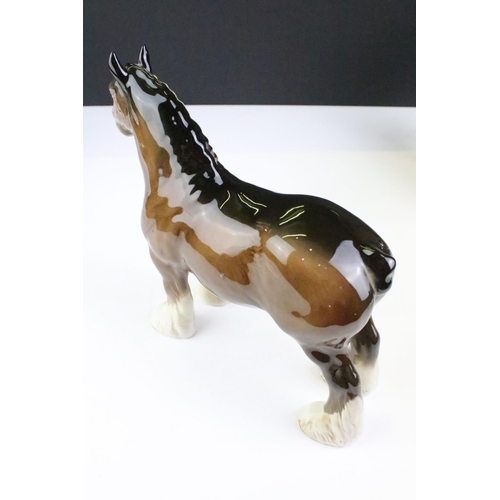 27 - Collection of seven Beswick porcelain horses / ponies to include six brown gloss examples and a matt... 