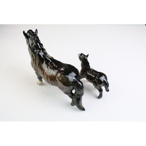 27 - Collection of seven Beswick porcelain horses / ponies to include six brown gloss examples and a matt... 