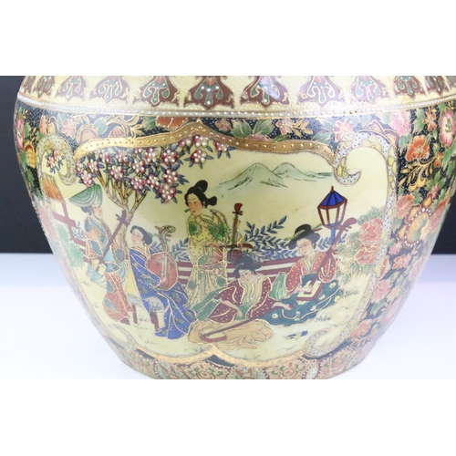 30 - Oriental ceramic fish bowl planter decorated with figural panels, enamel beading, and koi carp to in... 