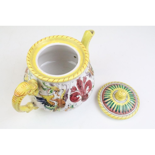 58 - Italian faience tea set with scrolling & floral decoration and yellow border, the lot to include tea... 