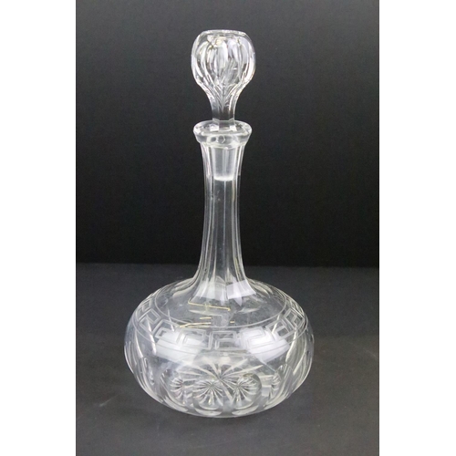 65 - Collection of cut glass to include four decanters with stoppers, a large footed bowl and a cut glass... 