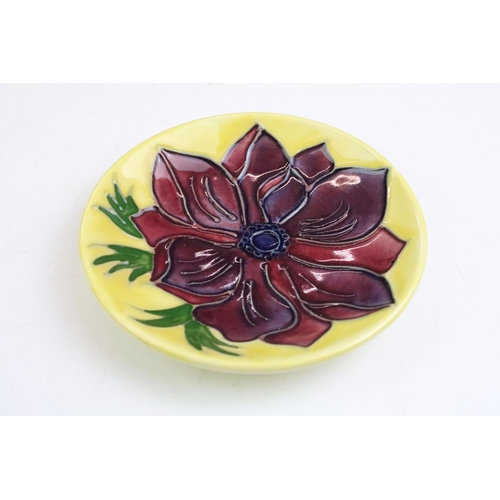 75 - Three boxed Moorcroft pottery pin dishes to include Violet, Anemone on yellow ground & Magnolia on i... 