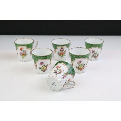 87 - Set of six Dresden coffee cups & saucers with hand painted floral decoration and gilt details on a s... 