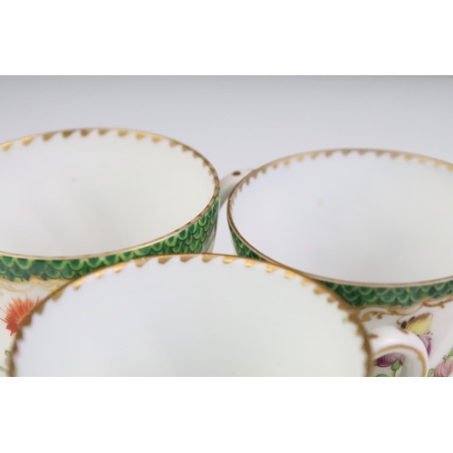 87 - Set of six Dresden coffee cups & saucers with hand painted floral decoration and gilt details on a s... 