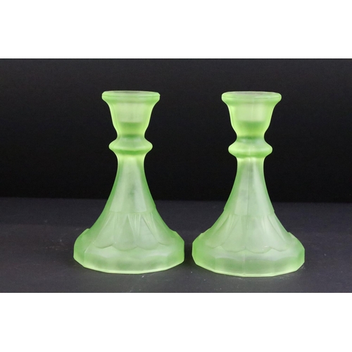 94 - Early-to-mid 20th century frosted uranium glass dressing table set, comprising candlesticks, jars, d... 