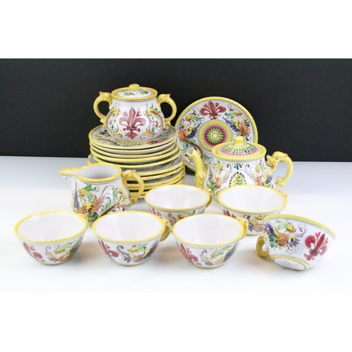 58 - Italian faience tea set with scrolling & floral decoration and yellow border, the lot to include tea... 