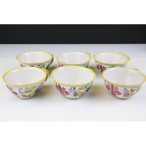 58 - Italian faience tea set with scrolling & floral decoration and yellow border, the lot to include tea... 