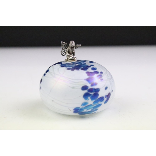 68 - John Ditchfield for Glasform - An iridescent glass paperweight surmounted by a silver fairy, makers ... 